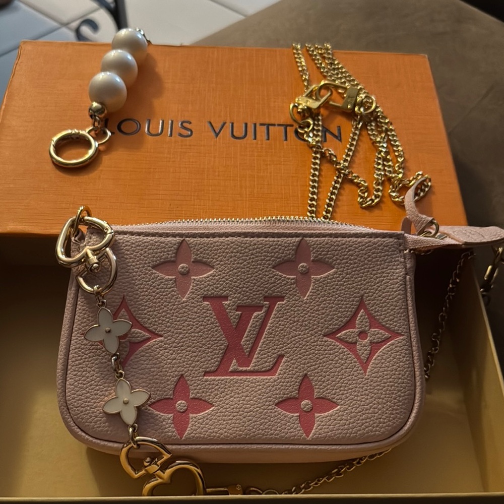 Louis Vuitton Pink Mini Bag with Monogram Design